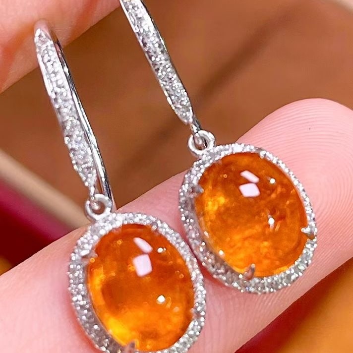 14k Gold 5.69 Ct Natural Spessartine & Diamond Earrings: Ref:231083167 // gold content:14k gold // main gemstone:spessartine // shape:oval // carat weight:5. 69ct // color:orange // treatment:natural // // adjacent gemstone 2 : diamond // number of