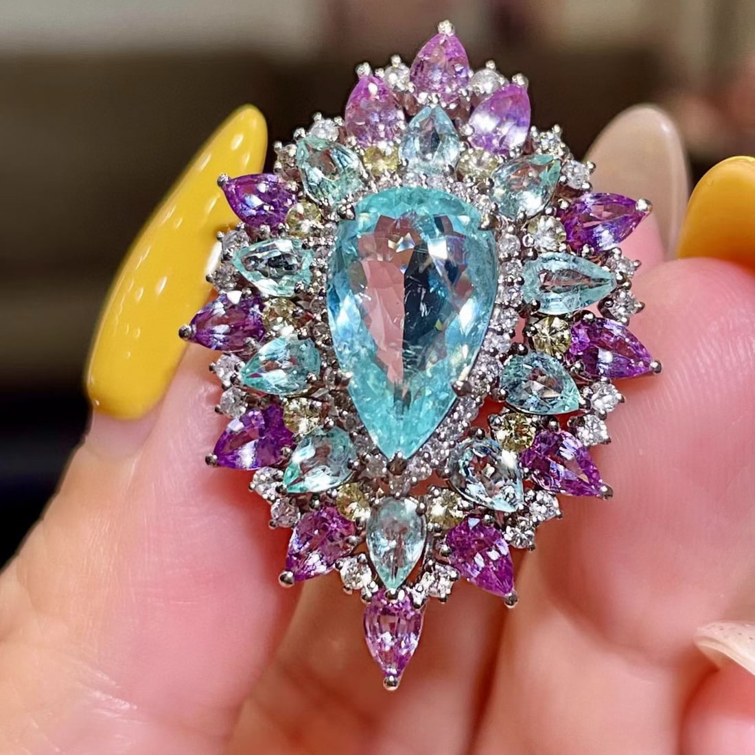 14k Gold 4.42 Ctw Natural Paraiba Tourmaline & Paraiba Tourmaline Ring: Ref:231083172 // gold content:14k gold // ring size:7. 25us // // main gemstone:paraiba tourmaline // shape:pear // carat weight:2. 85ct // color:blue // treatment:natural // // adjacent gemstone 2 :