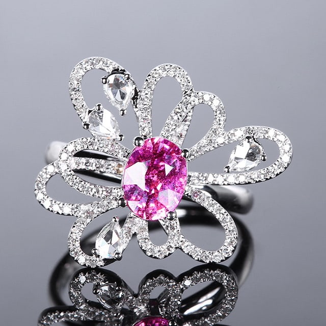 14k Gold 1.94 Ctw Natural Padparadscha Sapphire & Diamond Ring: Ref:231083222 // gold content:14k gold // ring size:7. 25us // // main gemstone:padparadscha sapphire // shape:oval // carat weight:1. 46ct // color:orangish pink // treatment:natural // // adjacent