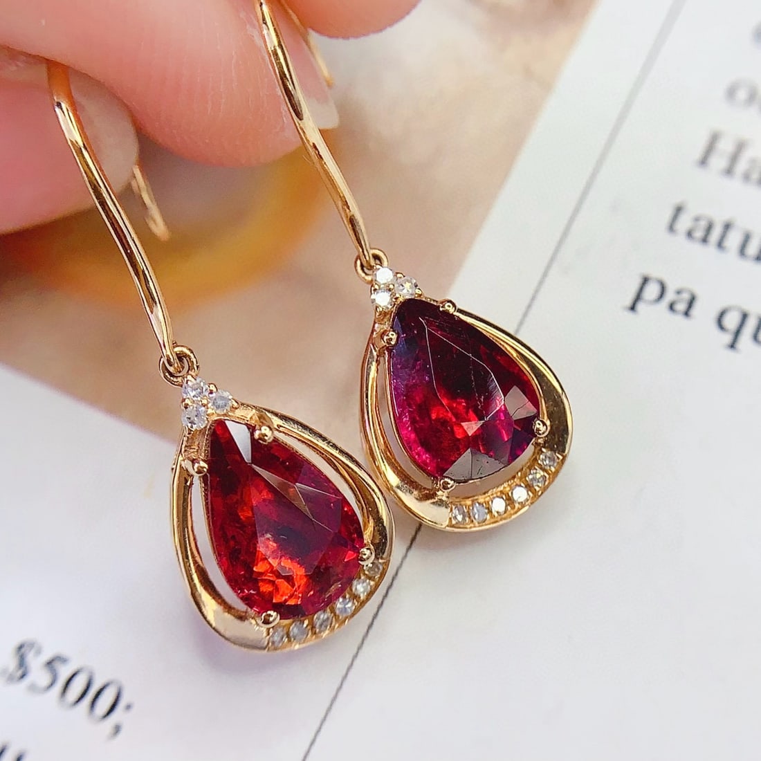 14k Gold 3 Ct Natural Tourmaline & Diamond Earrings: Ref:231083245 // gold content:14k gold // main gemstone:tourmaline // shape:pear // carat weight:3ct // color:red // treatment:natural // // adjacent gemstone 2 : diamond // number of stones:18 //