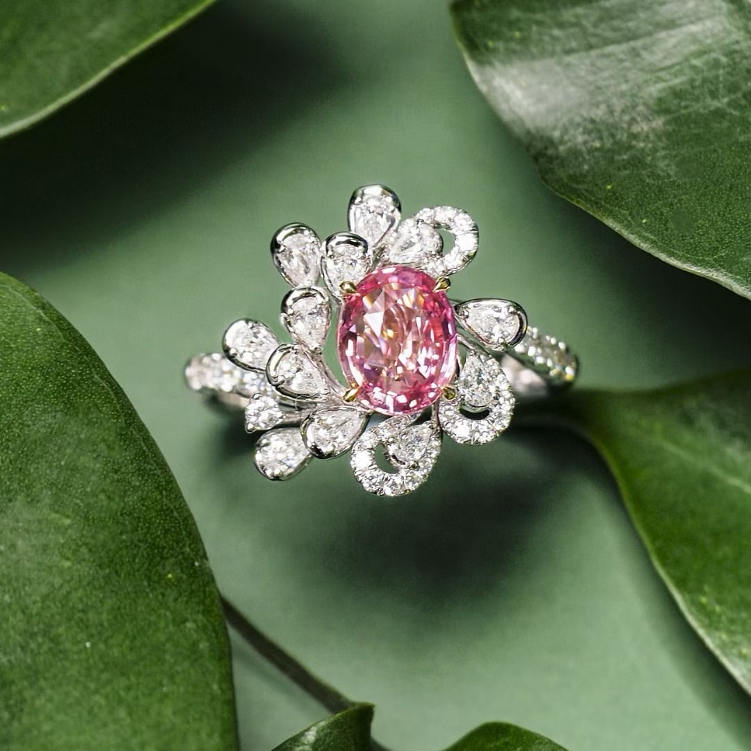 14k Gold 1.55 Ct Natural Padparadscha Sapphire & Diamond Ring: Ref:231084001 // gold content:14k gold // ring size:7. 25us // // main gemstone:padparadscha sapphire // shape:oval // carat weight:1. 55ct // color:orangish pink // treatment:natural // // adjacent