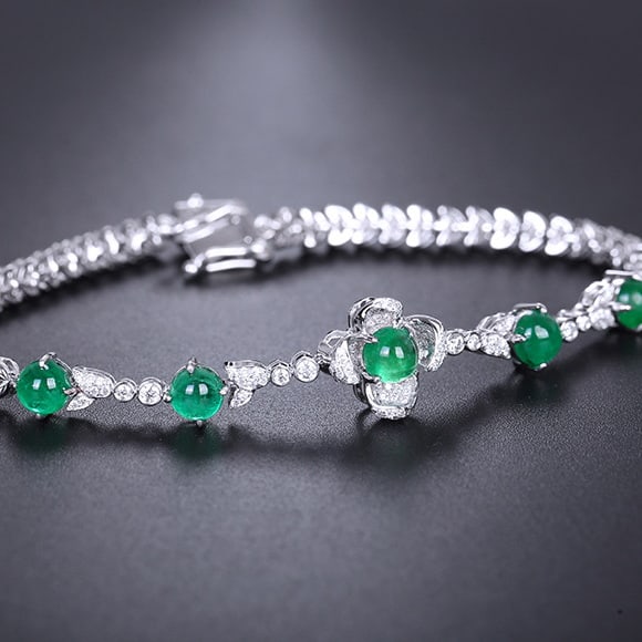 14k Gold 3.47 Ctw Natural Emerald & Diamond Bracelet: Ref:231084017 // gold content:14k gold // main gemstone:emerald // shape:round // carat weight:2. 7ct // color:green // treatment:natural // cut grade:g // // adjacent gemstone 2 : diamond //