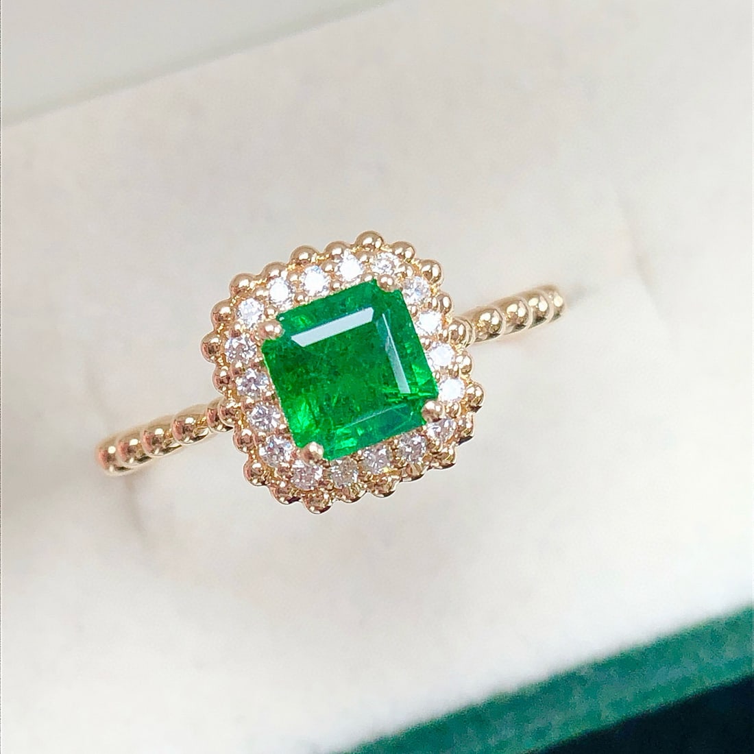 14k Gold 0.93 Ctw Vivid Green Natural Emerald & Diamond Ring: Ref:231084039 // gold content:14k gold // ring size:7. 25us // // main gemstone:emerald // shape:octagonal // carat weight:0. 81ct // color:vivid green // treatment:natural // // adjacent gemstone 2