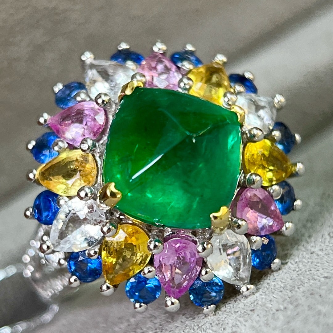 14k Gold 7.80 Ctw Vivid Green Natural Emerald & Sapphire Ring: Ref:231084059 // gold content:14k gold // ring size:7. 25us // // main gemstone:emerald // shape:sugar-loaf // carat weight:3. 30ct // color:vivid green // treatment:natural // // adjacent gemstone 2