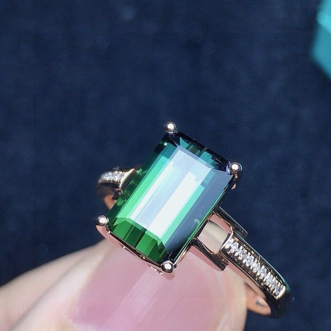 14k Gold 2.48 Ct Natural Tourmaline & Diamond Ring: Ref:231084205 // gold content:14k gold // ring size:7. 25us // // main gemstone:tourmaline // shape:octagonal // carat weight:2. 48ct // color:green // treatment:natural // // adjacent gemstone 2 : di