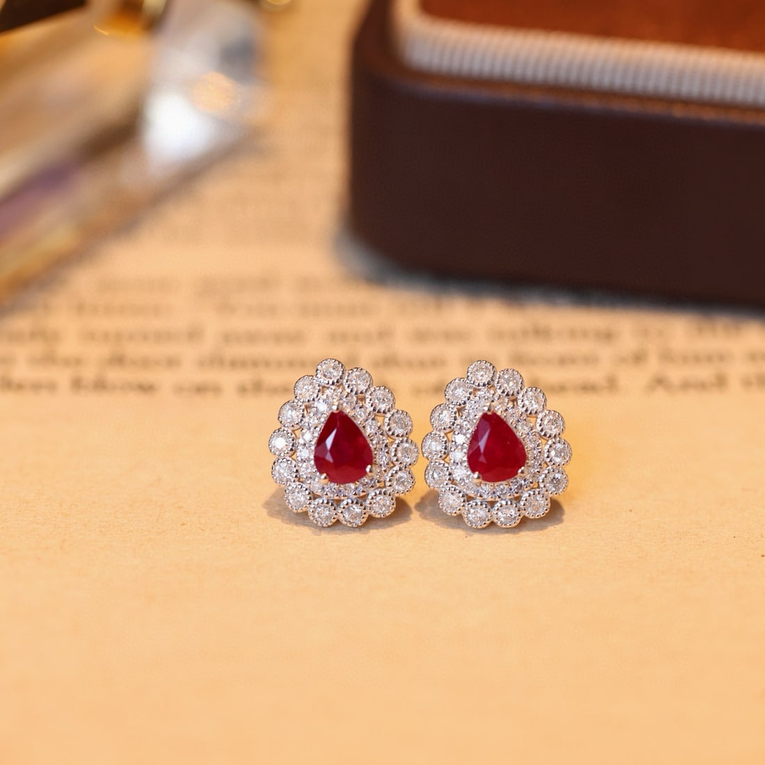 14k Gold 1.36 Ctw Natural Ruby & Diamond Earrings: Ref:231084228 // gold content:14k gold // main gemstone:ruby // shape:pear // carat weight:0. 8ct // color:pigeonblood red // treatment:natural // // adjacent gemstone 2 : diamond // shape:round //