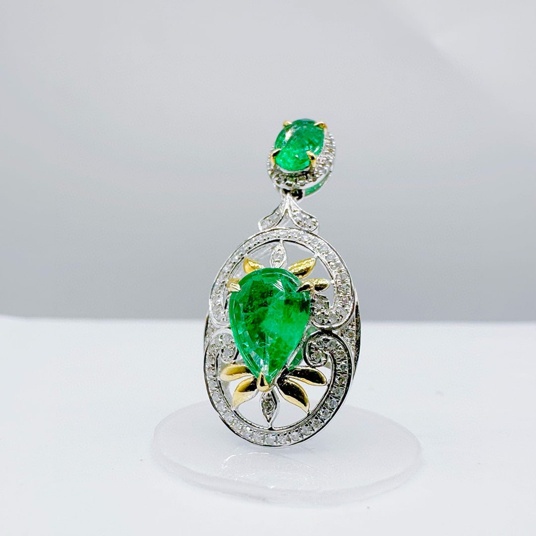 14k Gold 1.34 Ctw Vivid Green Natural Emerald & Diamond Pendant( Without Chain ): Ref:231084268 // gold content:14k gold // main gemstone:emerald // shape:pear // carat weight:1. 10ct // color:vivid green // treatment:natural // // adjacent gemstone 2 : diamond // shape:round //