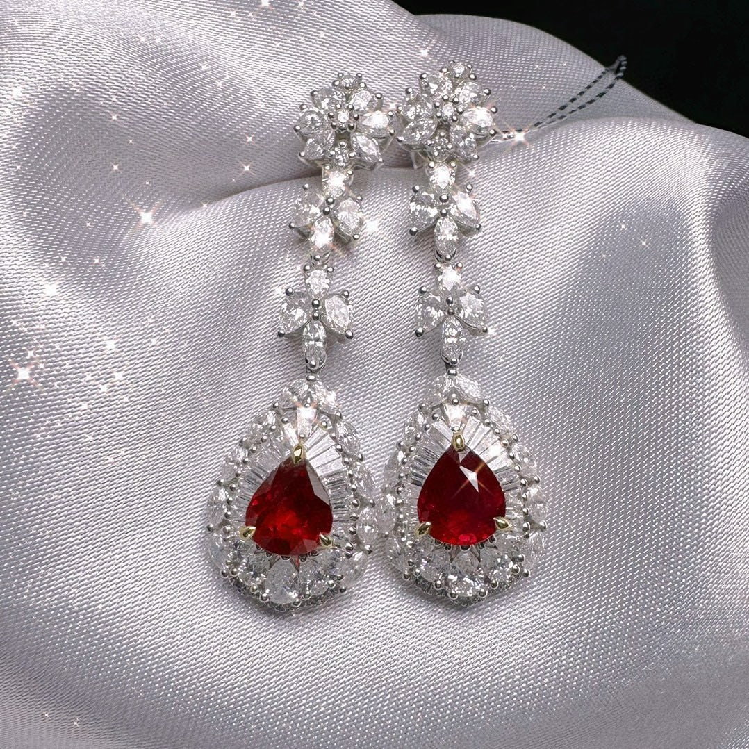 14k Gold 4.60 Ctw Natural Ruby & Diamond Earrings: Ref:231084269 // gold content:14k gold // main gemstone:ruby // shape:pear // carat weight:2. 10ct // color:pigeonblood red // treatment:natural // // adjacent gemstone 2 : diamond // shape:multiple