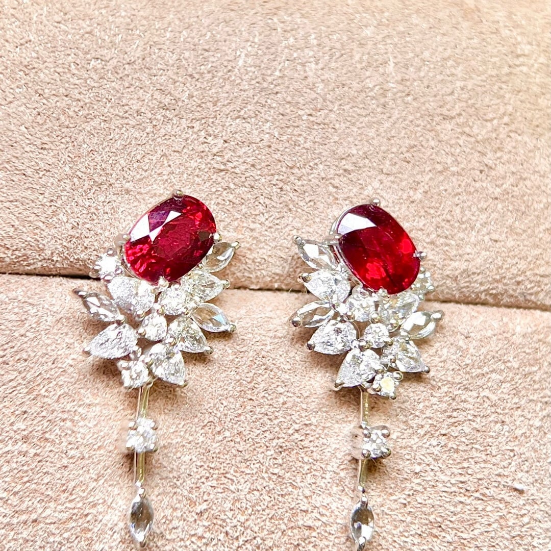 14k Gold 2.40 Ctw Natural Ruby & Diamond Earrings: Ref:231084277 // gold content:14k gold // main gemstone:ruby // shape:oval // carat weight:1. 45ct // color:pigeonblood red // treatment:natural // // adjacent gemstone 2 : diamond // shape:multiple