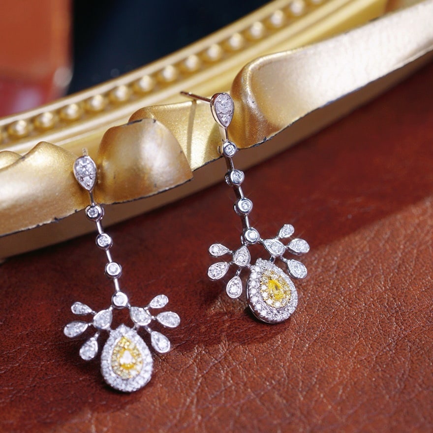 14k Gold 0.8 Ct Natural Color Diamond Earrings: Ref:231084293 // gold content:14k gold // main gemstone:diamond // shape:multiple // carat weight:0. 8ct // clarity grade:vs-si // color:color // treatment:natural // Condition: New Low Estimate: