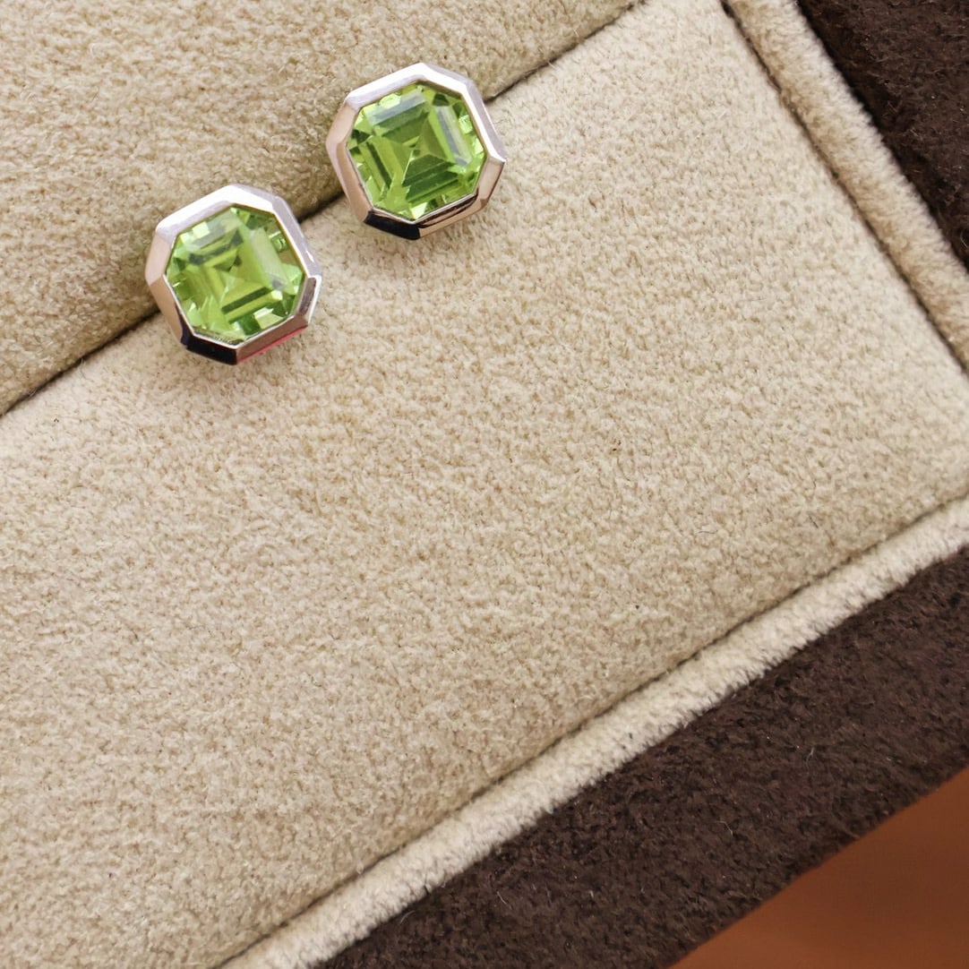 14k Gold 1.3 Ct Natural Peridot Earrings: Ref:231084398 // gold content:14k gold // main gemstone:peridot // shape:asscher // carat weight:1. 3ct // color:green // treatment:natural // Condition: New Low Estimate: 1100.00 High Estimate: