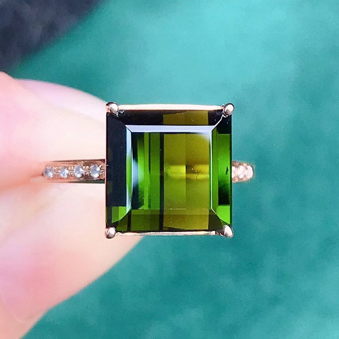 14k Gold 4.39 Ctw Natural Tourmaline & Diamond Ring: Ref:231084433 // gold content:14k gold // ring size:7. 25us // // main gemstone:tourmaline // shape:octagonal // carat weight:4. 35ct // color:green // treatment:natural // // adjacent gemstone 2 : di