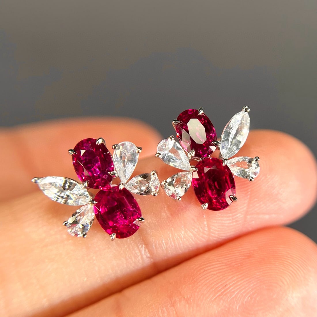 14k Gold 4.22 Ctw Natural Ruby & Sapphire Earrings: Ref:231084439 // gold content:14k gold // main gemstone:ruby // shape:oval // carat weight:2. 60ct // color:red // treatment:natural // // adjacent gemstone 2 : sapphire // shape:multiple // carat
