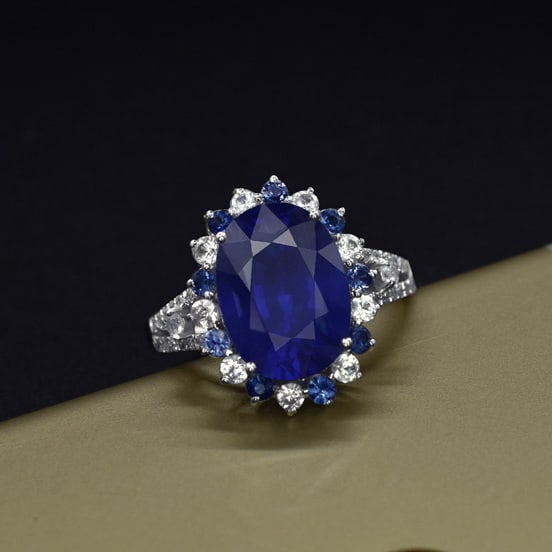 14k Gold 5.13 Ctw Natural Sapphire & Diamond Ring: Ref:231089010 // gold content:14k gold // ring size:7. 25us // // main gemstone:sapphire // shape:oval // carat weight:5. 06ct // color:blue // treatment:natural // // adjacent gemstone 2 : diamond