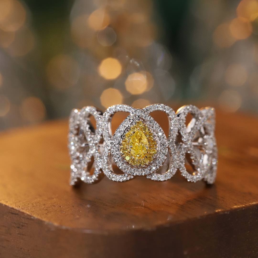 14k Gold 0.55 Ctw Natural Yellow Diamond & Diamond Ring: Ref:231089037 // gold content:14k gold // ring size:7. 25us // // main gemstone:yellow diamond // shape:pear // carat weight:0. 1ct // color:yellow // treatment:natural // // adjacent gemstone 2 :