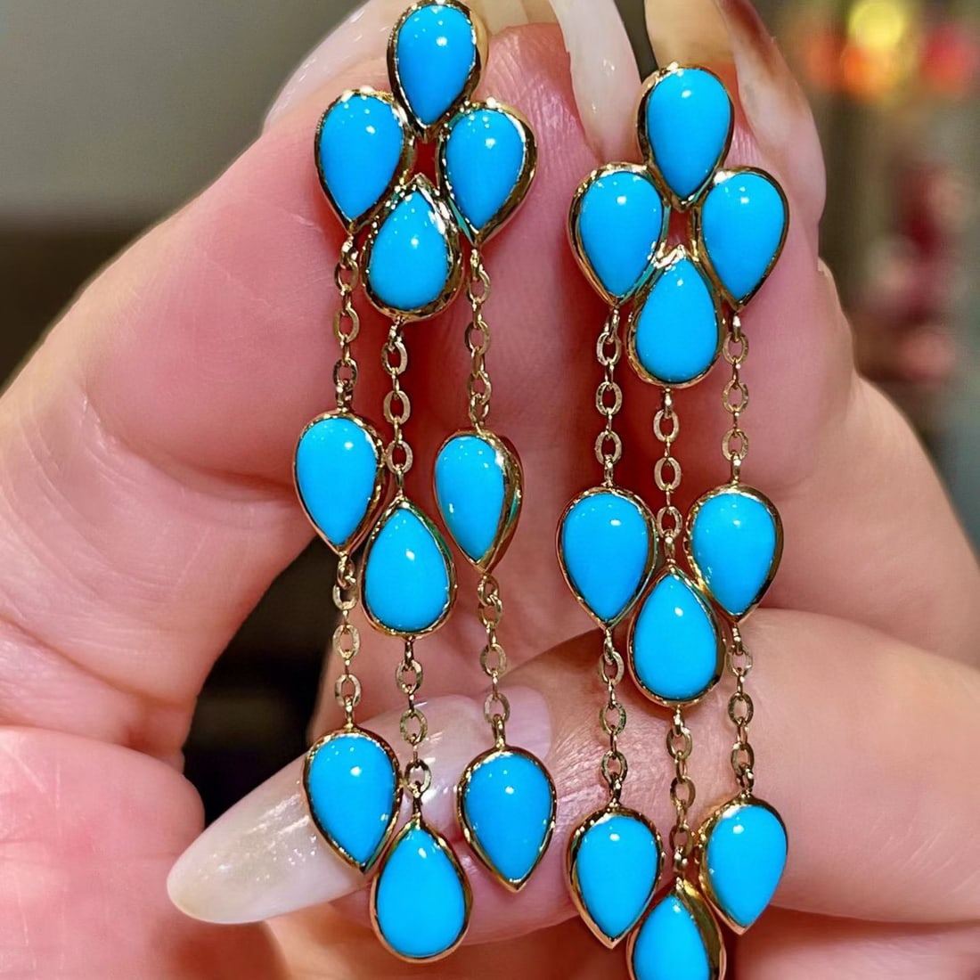 14k Gold 8.0 Ct Natural Blue Turquoise Earrings: Ref:231089126 // gold content:14k gold // main gemstone:blue turquoise // shape:pear // carat weight:8. 0ct // color:blue // treatment:natural // Condition: New Low Estimate: 5100.00 High Estimate: