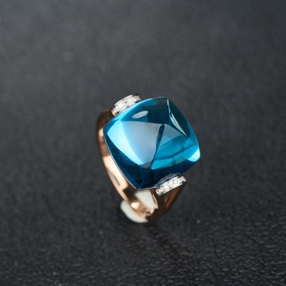 14k Gold 18.26 Ct Natural Topaz & Diamond Ring: Ref:231089159 // gold content:14k gold // ring size:7. 25us // // main gemstone:topaz // shape:sugar-loaf // carat weight:18. 26ct // color:blue // treatment:natural // // adjacent gemstone 2 :