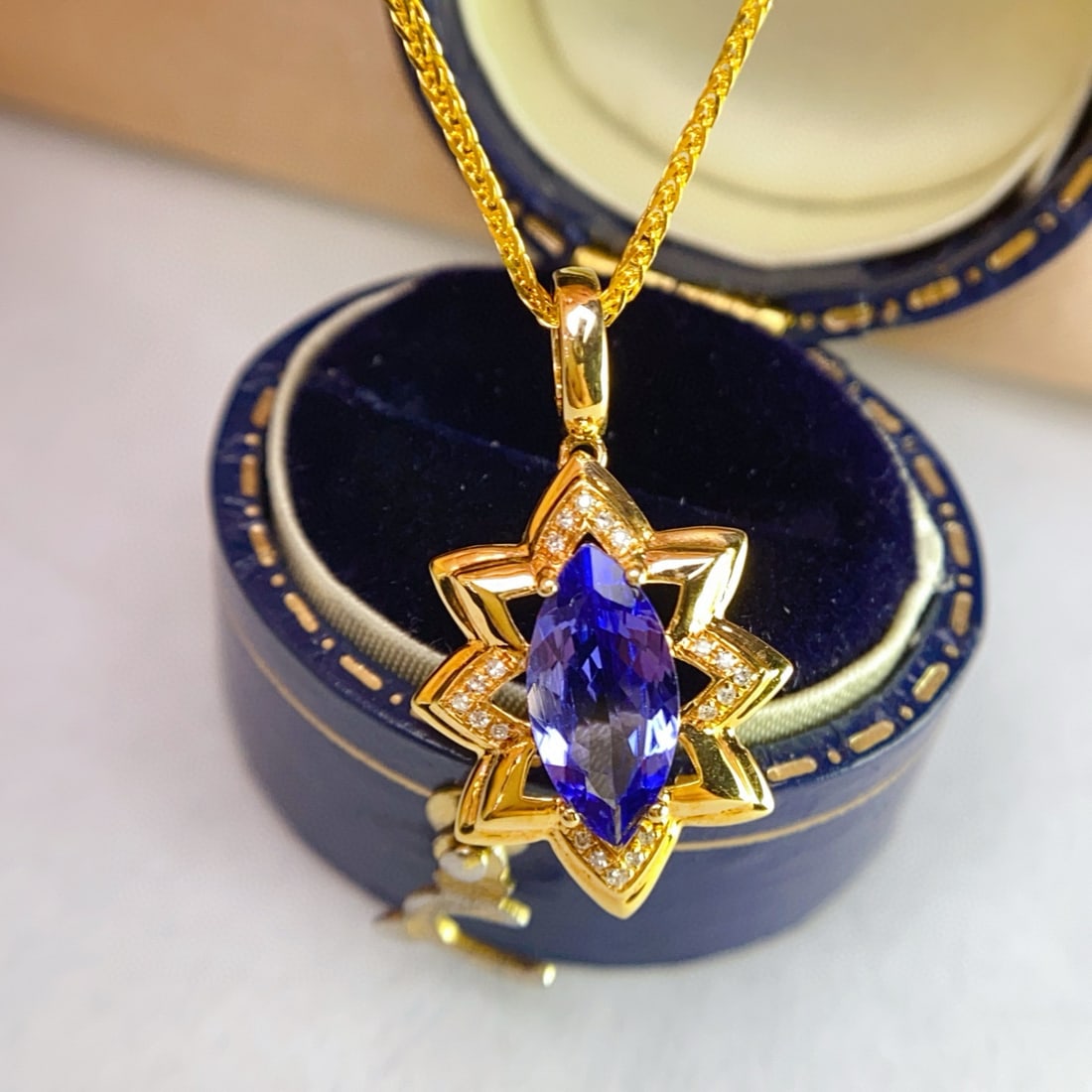14k Gold 1.15 Ct Natural Tanzanite & Diamond Pendant( Without Chain ): Ref:231089246 // gold content:14k gold // main gemstone:tanzanite // shape:marquise // carat weight:1. 15ct // color:blue // treatment:natural // // adjacent gemstone 2 : diamond // number of stones:2