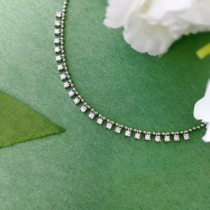14k Gold 1 Ct Natural H Diamond Necklace: Ref:231090001 // gold content:14k gold // main gemstone:diamond // shape:round // carat weight:1ct // clarity grade:vs-si // color:h // treatment:natural // cut grade:g // Condition: New Low Estimate: