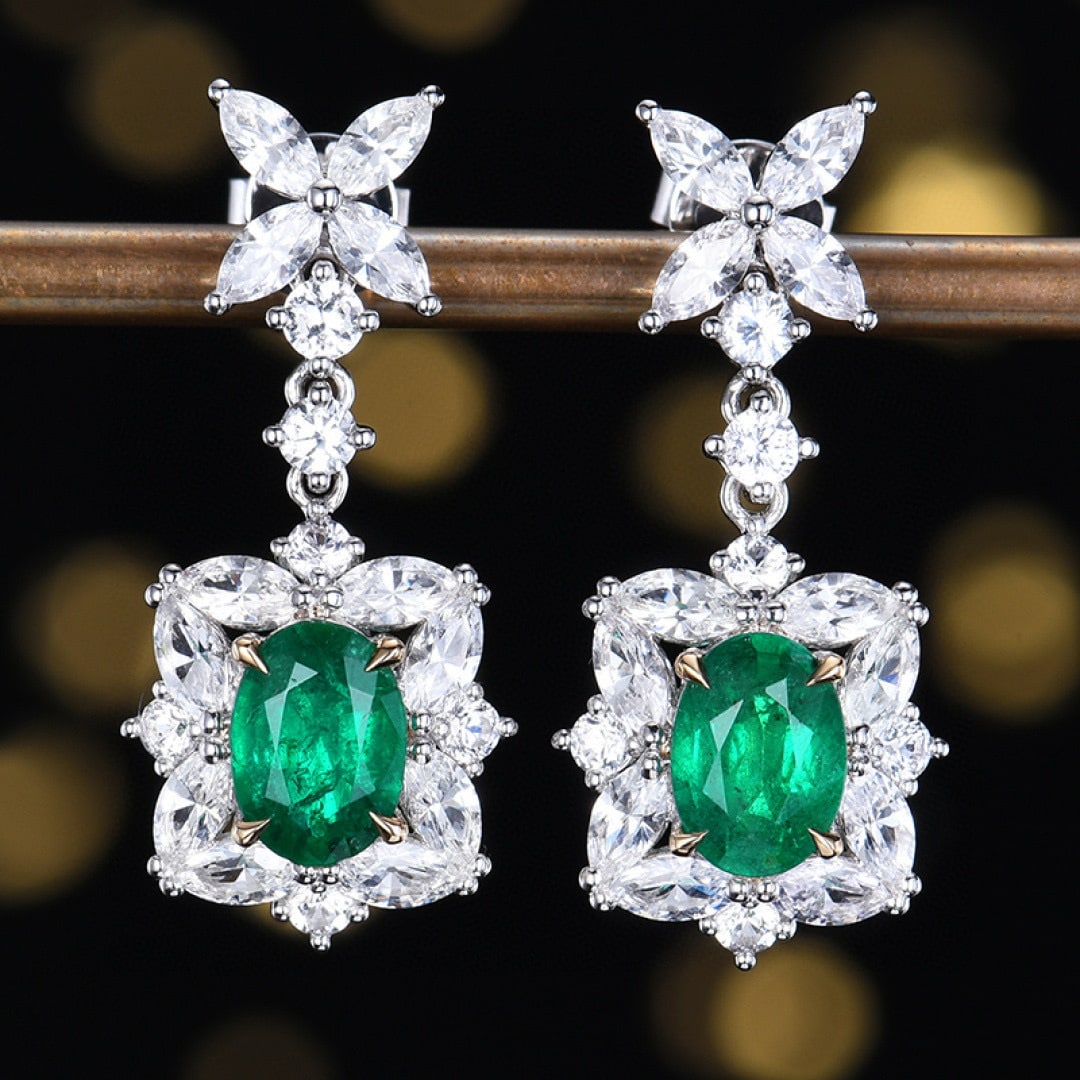 14k Gold 3.93 Ctw Vivid Green Natural Emerald & Sapphire Earrings: Ref:231090009 // gold content:14k gold // main gemstone:emerald // shape:oval // carat weight:1. 39ct // color:vivid green // treatment:natural // // adjacent gemstone 2 : sapphire // number of stones