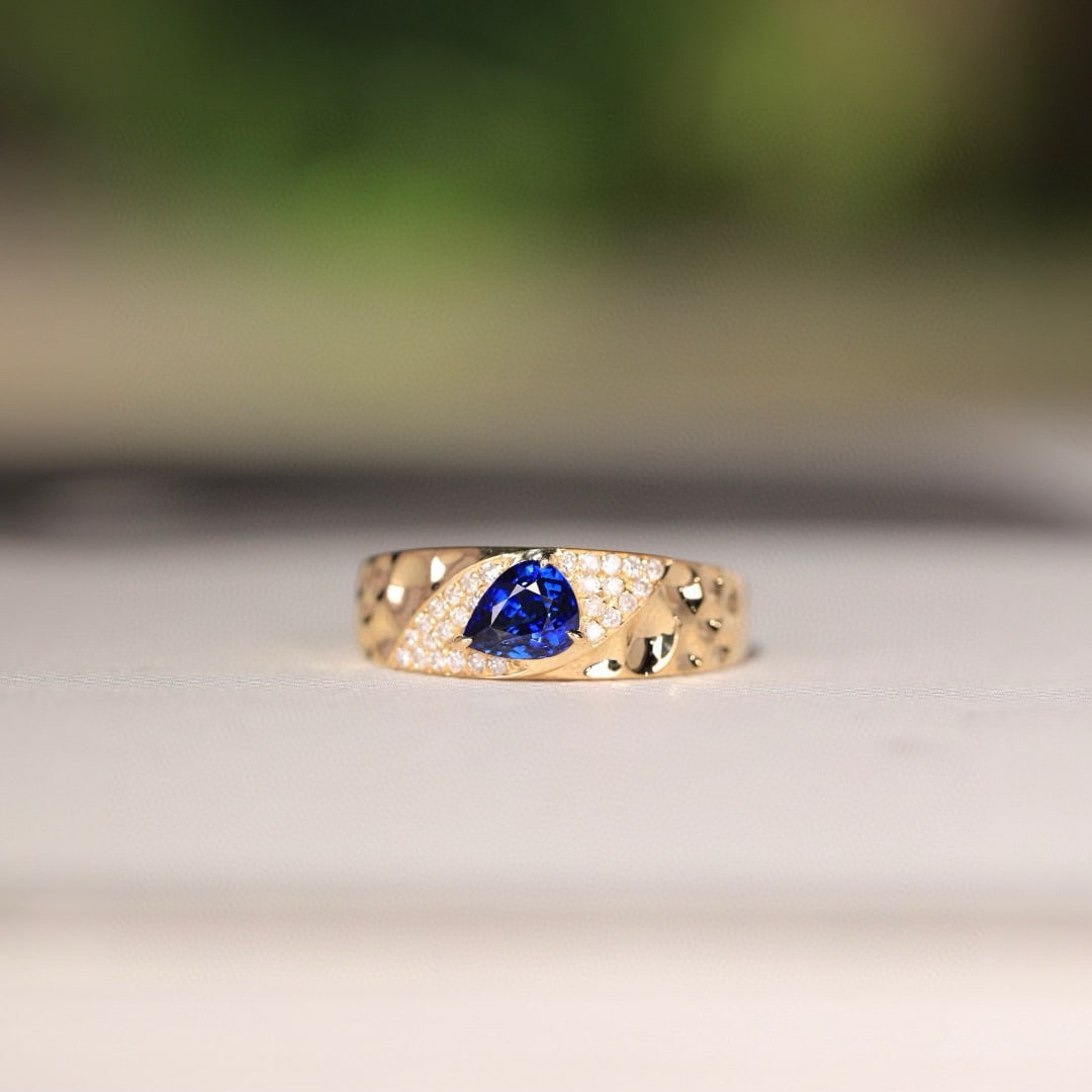 14k Gold 0.73 Ct Natural Sapphire & Diamond Ring: Ref:231090085 // gold content:14k gold // ring size:7. 25us // // main gemstone:sapphire // shape:pear // carat weight:0. 73ct // color:blue // treatment:natural // // adjacent gemstone 2 : diamond