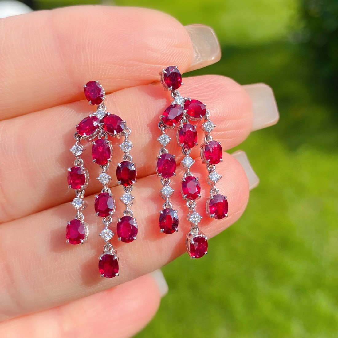 14k Gold 4.11 Ctw Natural Ruby & Diamond Earrings: Ref:231090153 // gold content:14k gold // main gemstone:ruby // shape:oval // carat weight:3. 82ct // color:red // treatment:natural // // adjacent gemstone 2 : diamond // shape:round // carat weight: