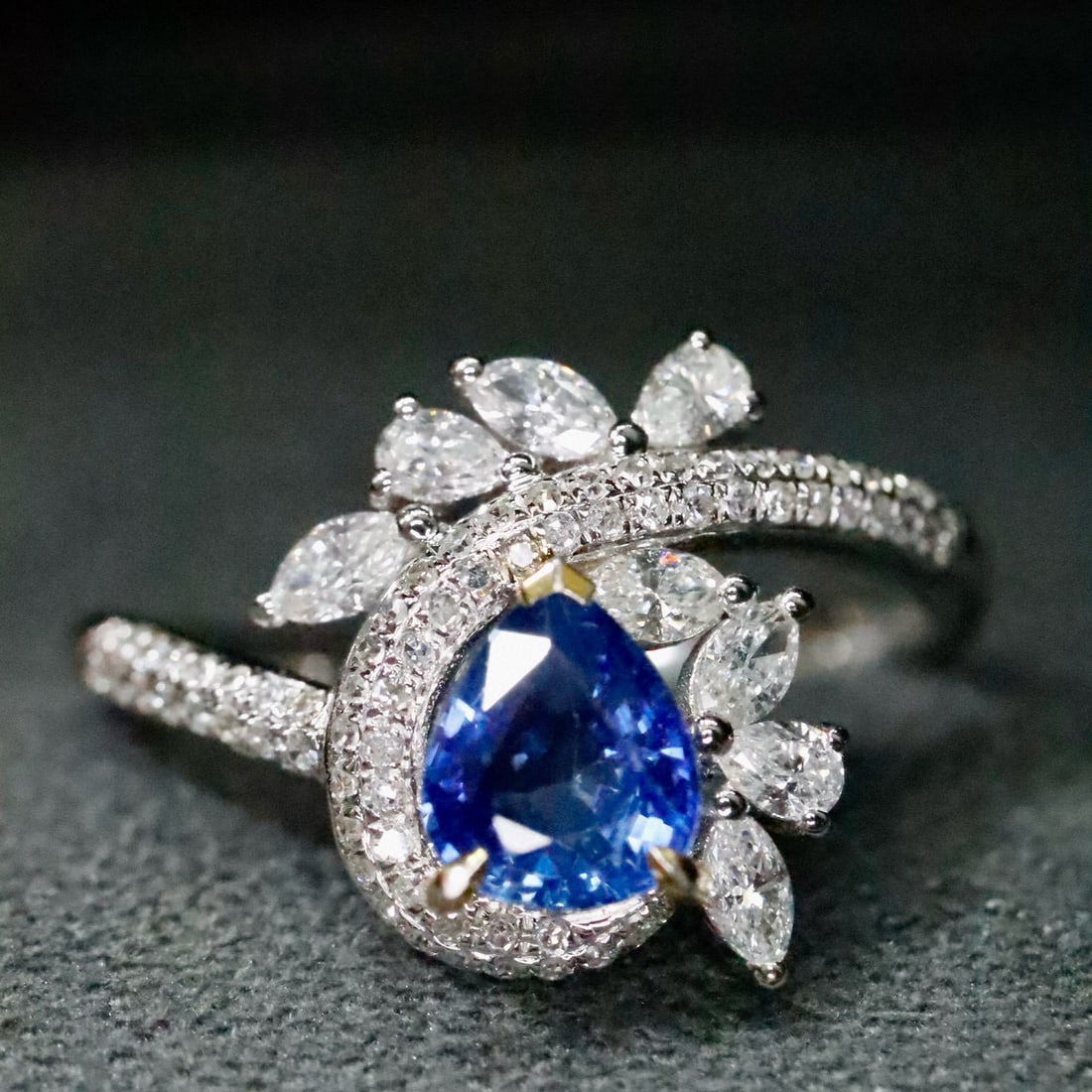 14k Gold 1.29 Ctw Natural Sapphire & Diamond Ring: Ref:231090278 // gold content:14k gold // ring size:7. 25us // // main gemstone:sapphire // shape:pear // carat weight:0. 75ct // color:blue // treatment:natural // // adjacent gemstone 2 : diamond
