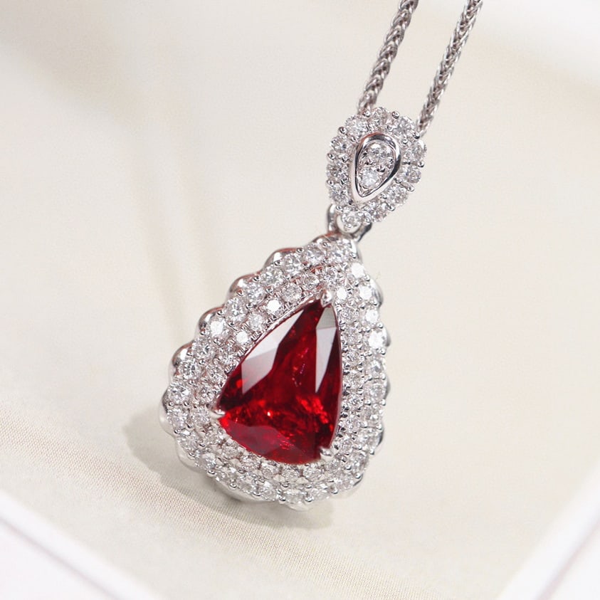 14k Gold 1.73 Ctw Natural Ruby & Diamond Pendant( Without Chain ): Ref:231090315 // gold content:14k gold // main gemstone:ruby // shape:pear // carat weight:1. 28ct // color:pigeonblood red // treatment:natural // // adjacent gemstone 2 : diamond // shape:round // c