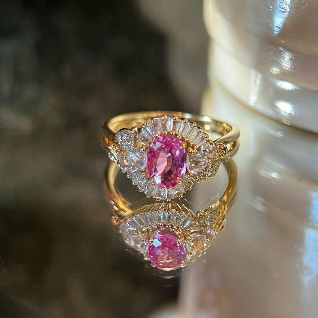 14k Gold 1.09 Ctw Natural Padparadscha Sapphire & Diamond Ring: Ref:231090359 // gold content:14k gold // ring size:7. 25us // // main gemstone:padparadscha sapphire // shape:oval // carat weight:1. 02ct // color:pink // treatment:natural // // adjacent gemstone