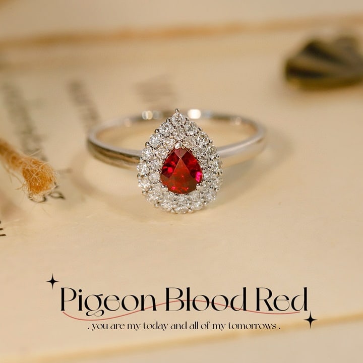 14k Gold 0.57 Ctw Natural Ruby & Diamond Ring: Ref:231090394 // gold content:14k gold // ring size:7. 25us // // main gemstone:ruby // shape:pear // carat weight:0. 30ct // color:pigeonblood red // treatment:natural // // adjacent gemstone 2 :