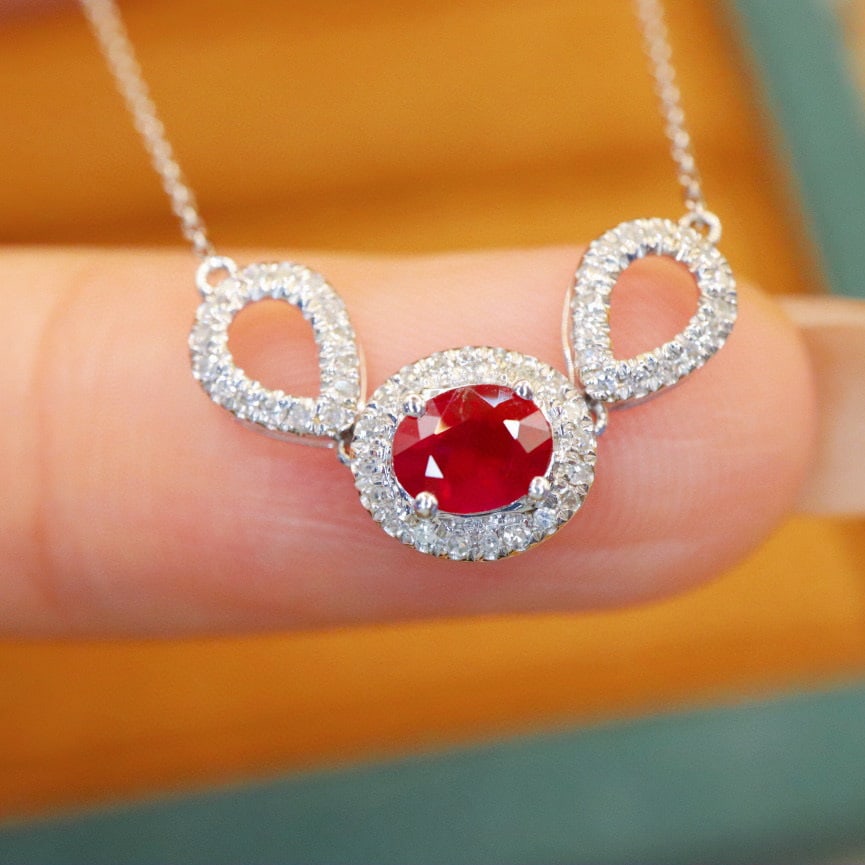 14k Gold 0.62 Ctw Natural Ruby & Diamond Necklace: Ref:231090395 // gold content:14k gold // main gemstone:ruby // shape:oval // carat weight:0. 47ct // color:red // treatment:natural // // adjacent gemstone 2 : diamond // number of stones:52 //