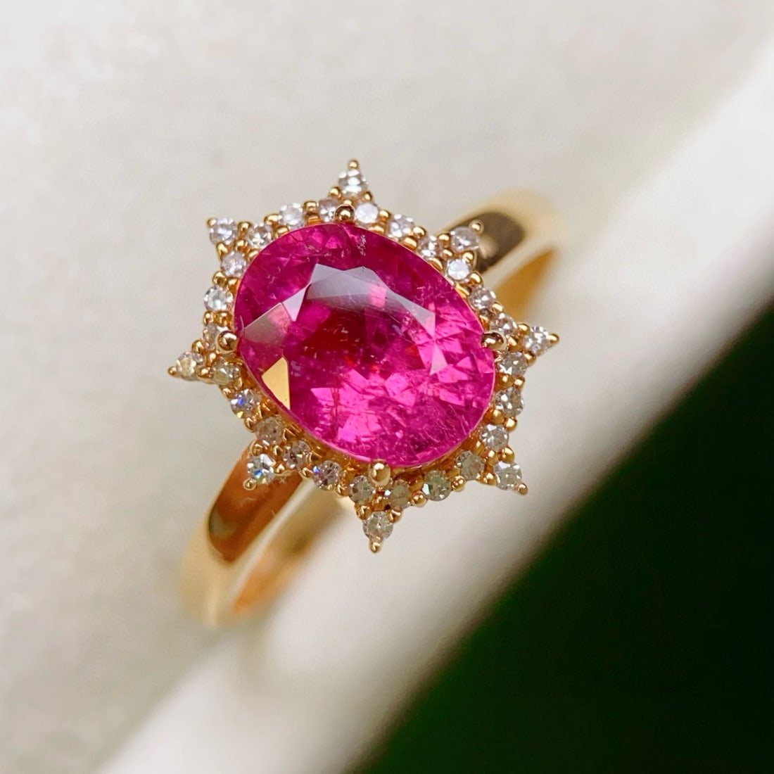 14k Gold 2.41 Ctw Natural Tourmaline & Diamond Ring: Ref:231090408 // gold content:14k gold // ring size:7. 25us // // main gemstone:tourmaline // shape:oval // carat weight:2. 25ct // color:red // treatment:natural // // adjacent gemstone 2 : diamond /