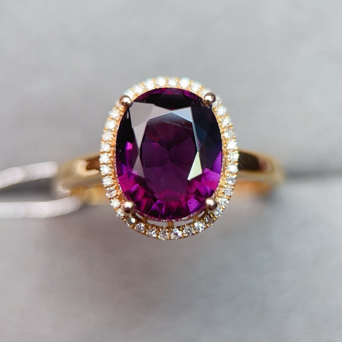 14k Gold 3.76 Ctw Natural Tourmaline & Diamond Ring: Ref:231090412 // gold content:14k gold // ring size:7. 25us // // main gemstone:tourmaline // shape:oval // carat weight:3. 65ct // color:purple // treatment:natural // // adjacent gemstone 2 :