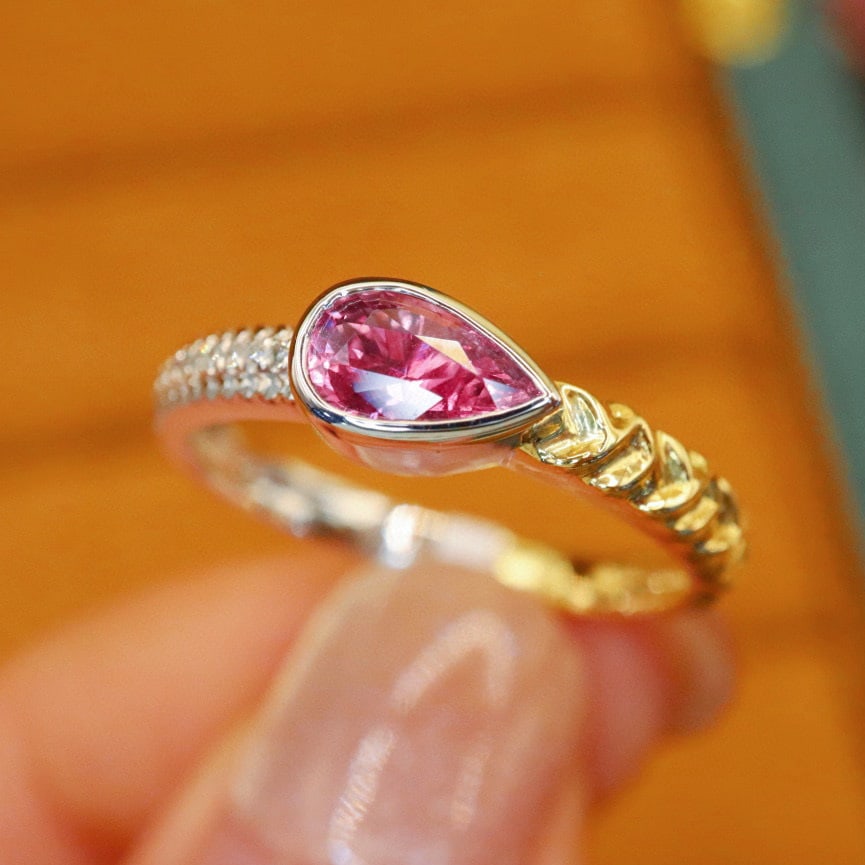 14k Gold 0.81 Ctw Natural Sapphire & Diamond Ring: Ref:231090416 // gold content:14k gold // ring size:7. 25us // // main gemstone:sapphire // shape:pear // carat weight:0. 78ct // color:pink // treatment:natural // // adjacent gemstone 2 : diamond
