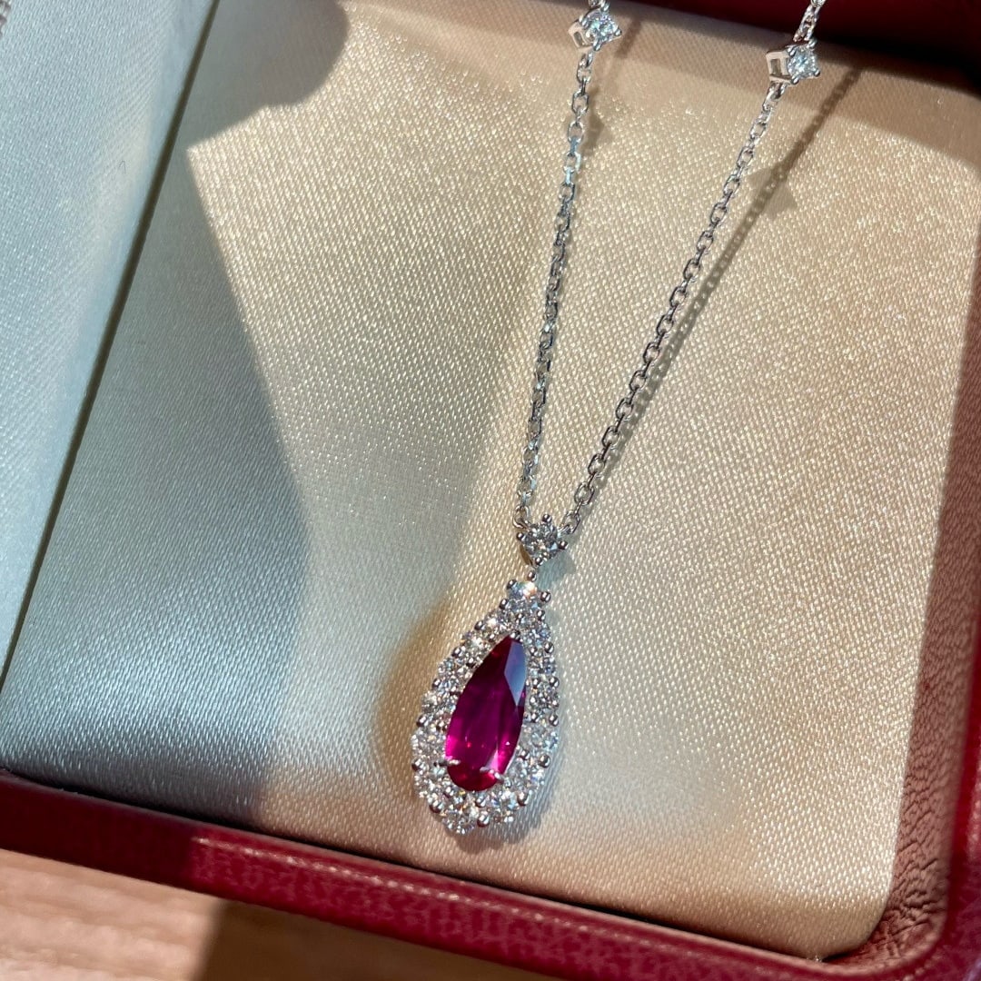 14k Gold 0.7 Ct Natural Ruby & Diamond Necklace: Ref:231090435 // gold content:14k gold // main gemstone:ruby // shape:pear // carat weight:0. 7ct // color:red // treatment:natural // // adjacent gemstone 2 : diamond // shape:round // clarity