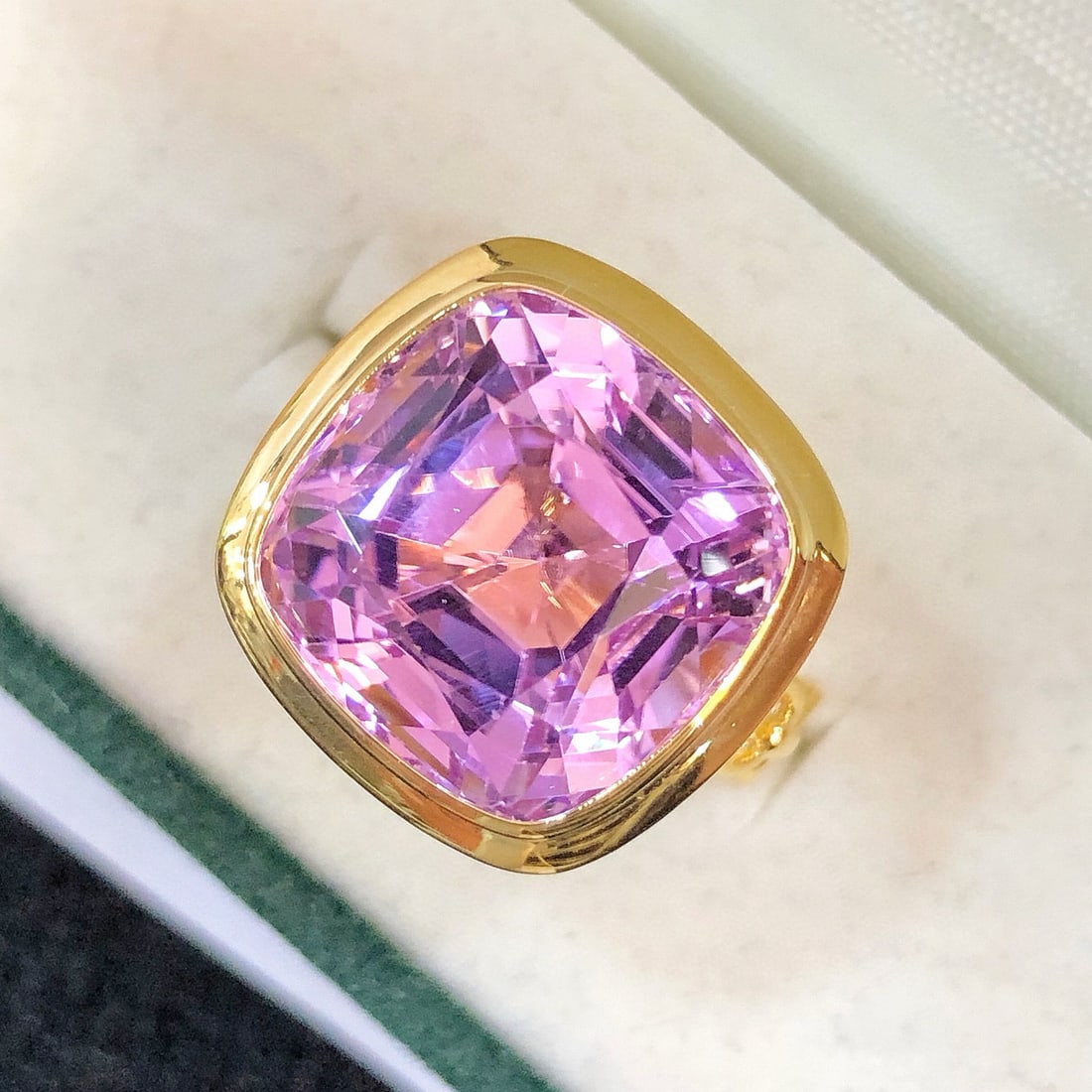 14k Gold 16.0 Ct Natural Kunzite Ring: Ref:231081021 // gold content:14k gold // ring size:7. 25us // // main gemstone:kunzite // shape:cushion // carat weight:16. 0ct // color:purple // treatment:natural // Condition: New Low Estimate: