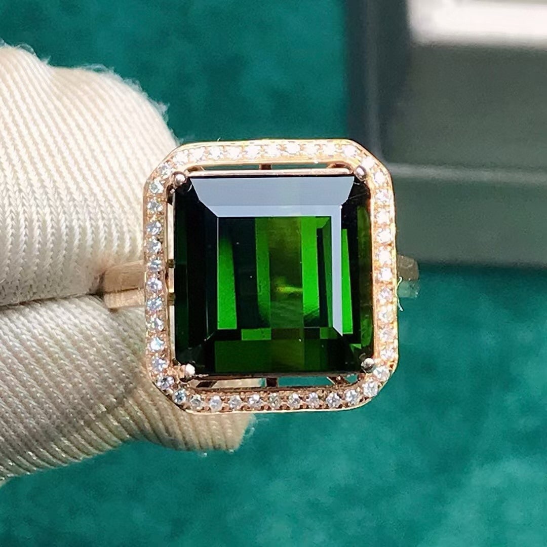 14k Gold 8.18 Ctw Natural Tourmaline & Diamond Ring: Ref:231081052 // gold content:14k gold // ring size:7. 25us // // main gemstone:tourmaline // shape:octagonal // carat weight:8. 05ct // color:green // treatment:natural // // adjacent gemstone 2 :