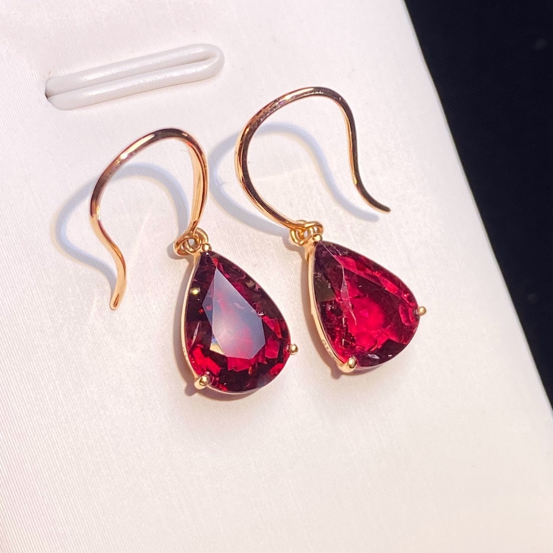 14k Gold 3.63 Ct Natural Tourmaline Earrings: Ref:231081135 // gold content:14k gold // main gemstone:tourmaline // shape:pear // carat weight:3. 63ct // color:red // treatment:natural // Condition: New Low Estimate: 3100.00 High Estimate: