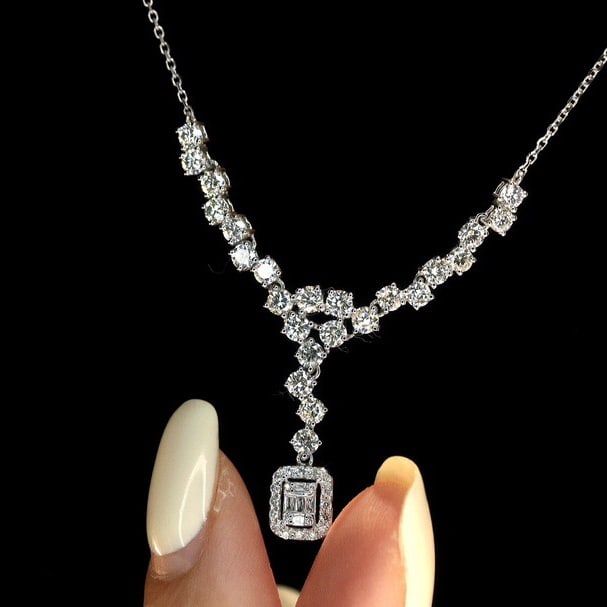 14k Gold 1.7 Ct Natural H Diamond Necklace: Ref:231082124 // gold content:14k gold // main gemstone:diamond // shape:multiple // carat weight:1. 7ct // clarity grade:vs-si // color:h // treatment:natural // Condition: New Low Estimate: 6200.00