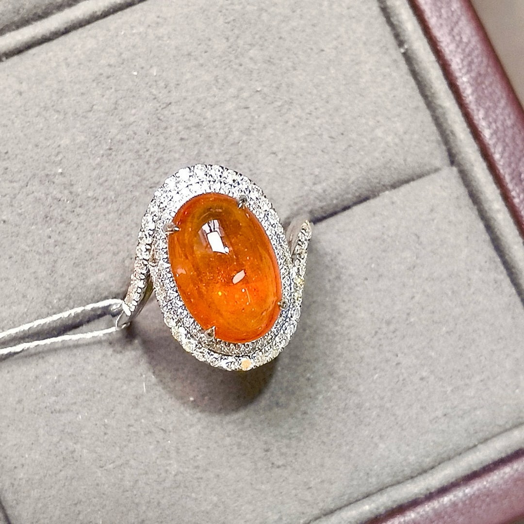 14k Gold 6.85 Ctw Natural Spessartine & Diamond Ring: Ref:231082126 // gold content:14k gold // ring size:7. 25us // // main gemstone:spessartine // shape:oval // carat weight:6. 33ct // color:orange // treatment:natural // // adjacent gemstone 2 :