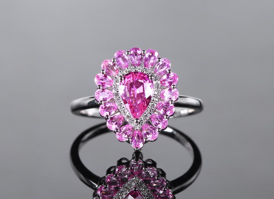 14k Gold 1.91 Ctw Natural Padparadscha Sapphire & Diamond Ring: Ref:231082248 // gold content:14k gold // ring size:7. 25us // // main gemstone:padparadscha sapphire // shape:pear // carat weight:1. 84ct // color:orangish pink // treatment:natural // // adjacent