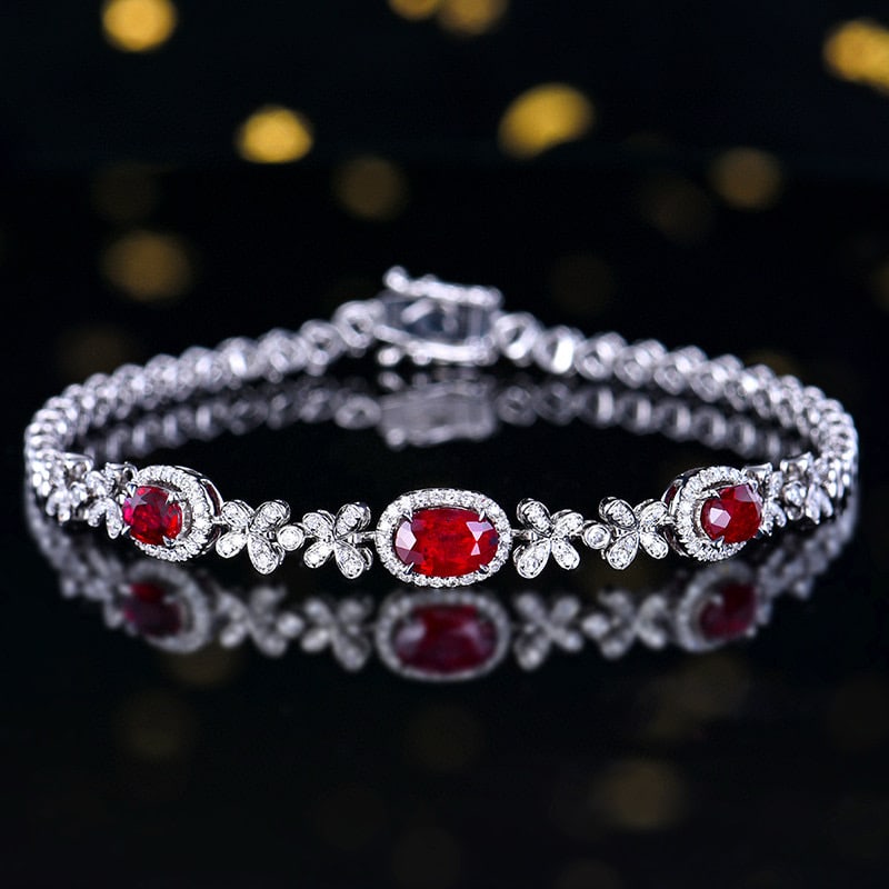 14k Gold 1.76 Ctw Natural Ruby & Diamond Bracelet: Ref:231082265 // gold content:14k gold // main gemstone:ruby // shape:oval // carat weight:1. 4ct // color:pigeonblood red // treatment:natural // // adjacent gemstone 2 : diamond // number of