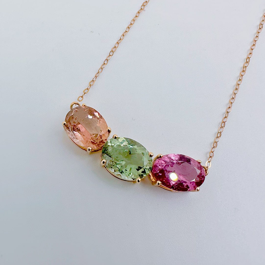 14k Gold 6.10 Ct Natural Tourmaline Necklace: Ref:231082347 // gold content:14k gold // main gemstone:tourmaline // shape:oval // carat weight:6. 10ct // color:color // treatment:natural // Condition: New Low Estimate: 2900.00 High Estimate: