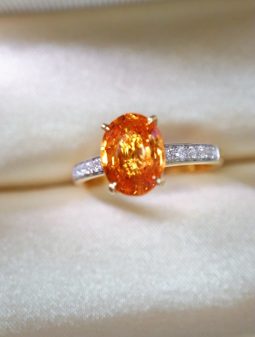 14k Gold 2.40 Ctw Natural Spessartine & Diamond Ring: Ref:231082424 // gold content:14k gold // ring size:7. 25us // // main gemstone:spessartine // shape:oval // carat weight:2. 25ct // color:orange // treatment:natural // // adjacent gemstone 2 :