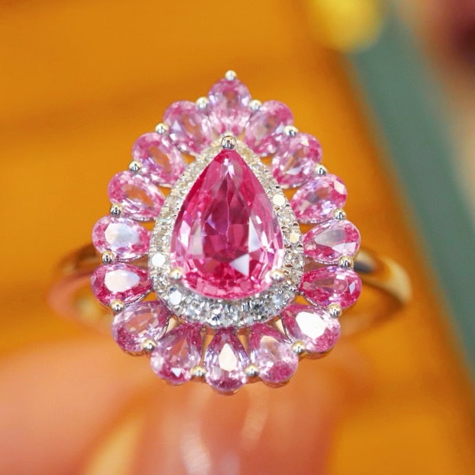 14k Gold 1.91 Ctw Natural Padparadscha Sapphire & Diamond Ring: Ref:231081063 // gold content:14k gold // ring size:7. 25us // // main gemstone:padparadscha sapphire // shape:pear // carat weight:1. 84ct // color:orangish pink // treatment:natural // // adjacent