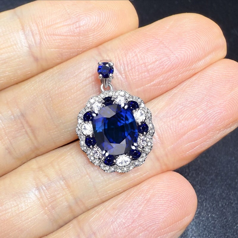 14k Gold 2.75 Ctw Natural Sapphire & Sapphire Pendant( Without Chain ): Ref:231081065 // gold content:14k gold // main gemstone:sapphire // shape:oval // carat weight:2. 36ct // color:blue // treatment:natural // // adjacent gemstone 2 : sapphire // shape:round // carat