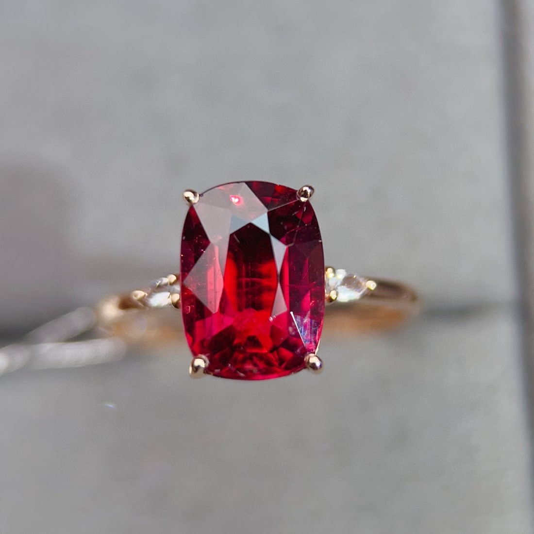 14k Gold 2.9 Ct Natural Tourmaline & Sapphire Ring: Ref:231081131 // gold content:14k gold // ring size:7. 25us // // main gemstone:tourmaline // shape:cushion // carat weight:2. 9ct // color:red // treatment:natural // // adjacent gemstone 2 :