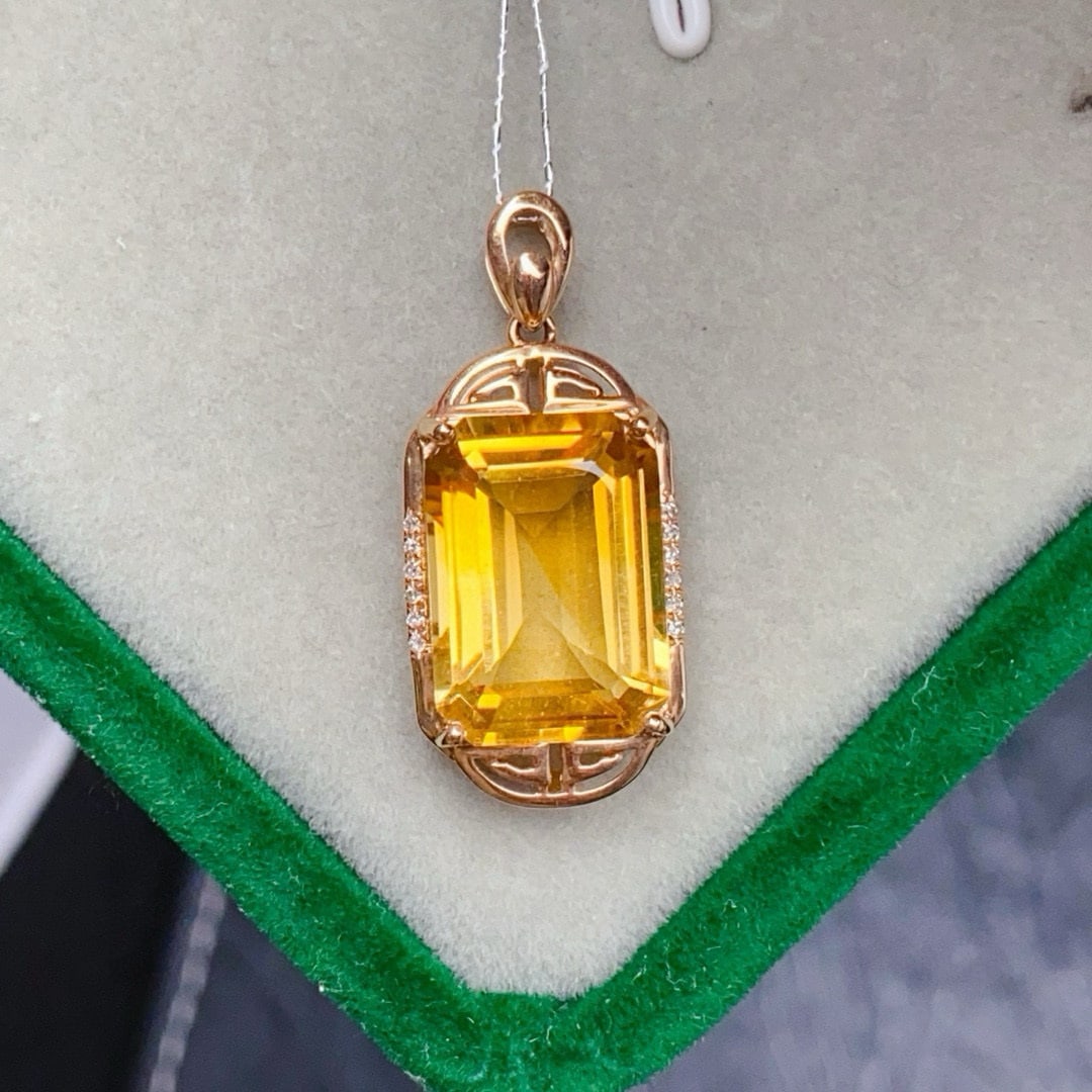 14k Gold 6.43 Ctw Natural Citrine & Diamond Pendant( Without Chain ): Ref:231081137 // gold content:14k gold // main gemstone:citrine // shape:octagonal // carat weight:6. 4ct // color:yellow // treatment:natural // // adjacent gemstone 2 : diamond // number of