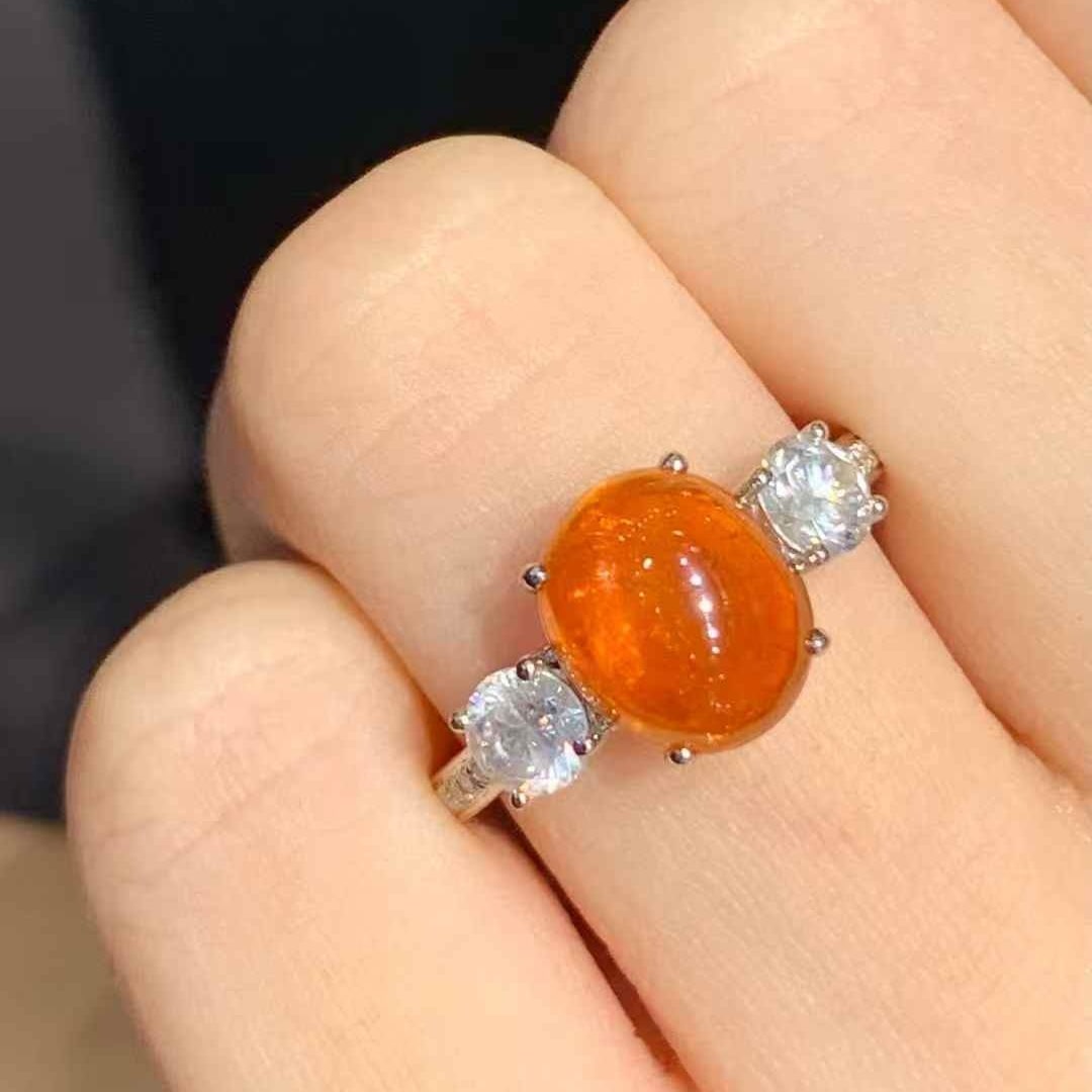 14k Gold 5.25 Ctw Natural Spessartine & Diamond Ring: Ref:231081218 // gold content:14k gold // ring size:7. 25us // // main gemstone:spessartine // shape:oval // carat weight:4. 55ct // color:orange // treatment:natural // // adjacent gemstone 2 :