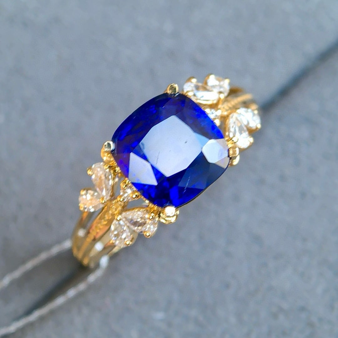 14k Gold 2.69 Ctw Vivid Blue Natural Sapphire & Diamond Ring: Ref:231082068 // gold content:14k gold // ring size:7. 25us // // main gemstone:sapphire // shape:cushion // carat weight:2. 38ct // color:vivid blue // treatment:natural // // adjacent gemstone 2 :
